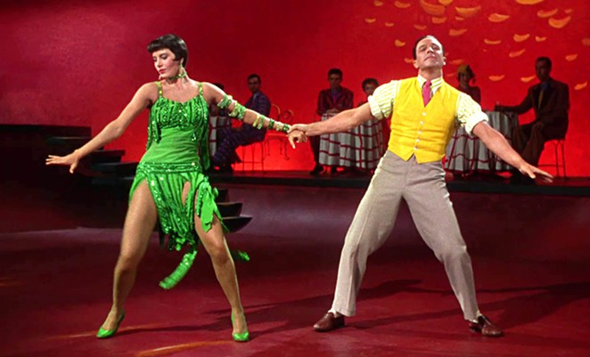 SILENCE IS GOLDEN: Starlet Lina Lamont (Jean Hagen) may not have the voice for talkies as silent film star Don Lockwood (Gene Kelly, right, dancing with Cyd Charisse) makes the transition in the classic 1952 musical, Singin’ in the Rain, screening this week at The Palm Theatre.