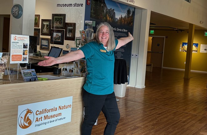 WARM WELCOME: Guests of the California Nature Art Museum (or Cal-NAM for short, formerly the Wildling Museum of Nature and Art) in downtown Solvang are often greeted by the venue’s store and visitor services manager, Sheila Francis.