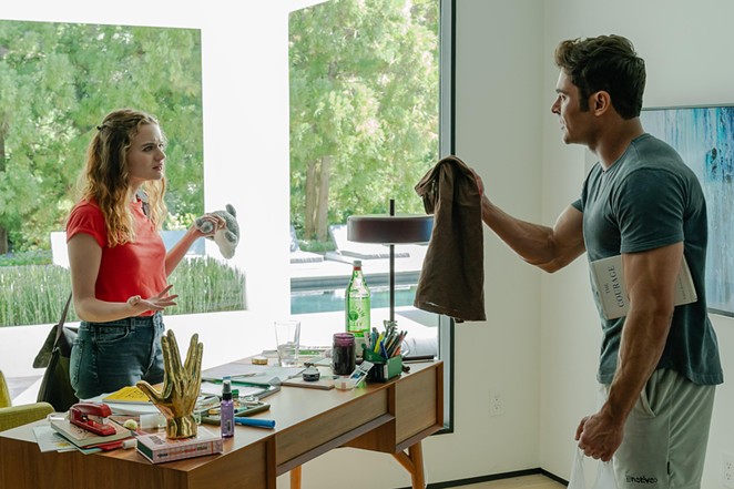 DIVA BOSS: Assistant Zara Ford (Joey King) has to deal with her Hollywood star boss, Chris Cole (Zac Efron), who ends up having an affair with her mom, in A Family Affair, screening on Netflix.