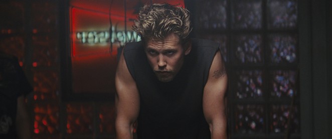 BADASS: Austin Butler stars as Benny, a member of Chicago motorcycle gang the Vandals, who’s in the club as it slides toward criminality, in The Bikeriders, streaming on Peacock and other services.