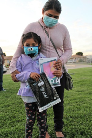 Santa Maria families receive tablets to keep them connected during pandemic