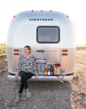 Local winemaker Alisa Jacobson celebrates the bottling of two new Turning Tide wines