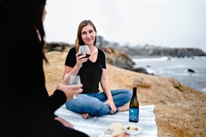 Local winemaker Alisa Jacobson celebrates the bottling of two new Turning Tide wines