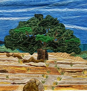 The walls of the California Nature Art Museum are decorated with quilts depicting animal scenes